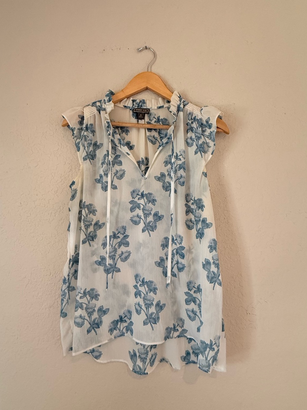 White and blue floral printed blouse
